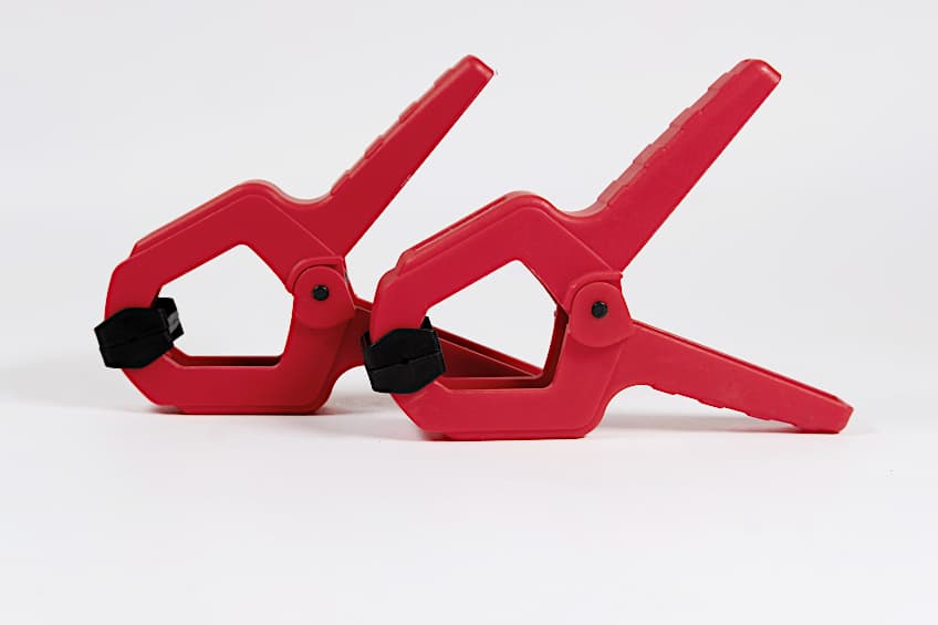 Clamps for Bonding Plastic to Metal